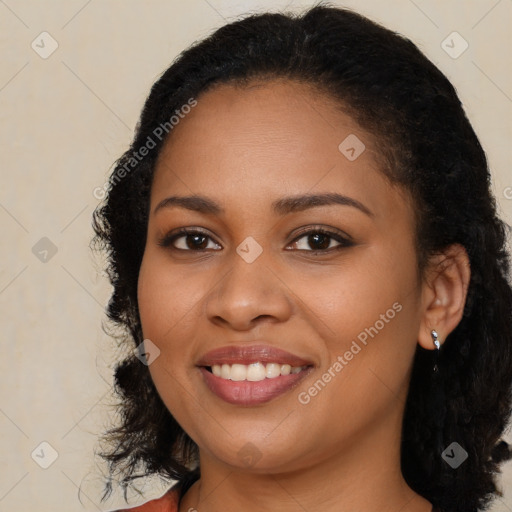 Joyful latino young-adult female with long  black hair and brown eyes