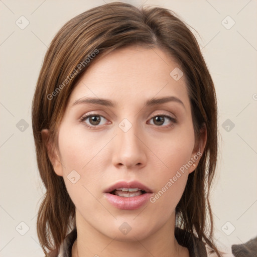 Neutral white young-adult female with medium  brown hair and grey eyes