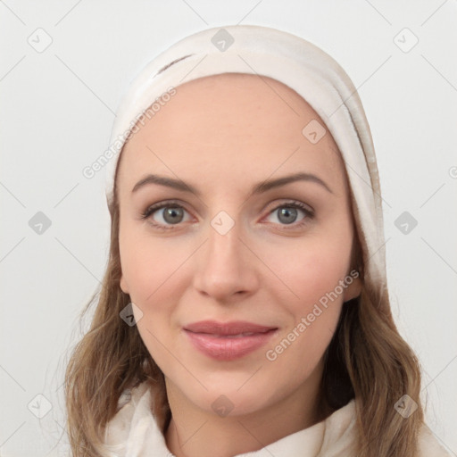 Joyful white young-adult female with medium  brown hair and blue eyes