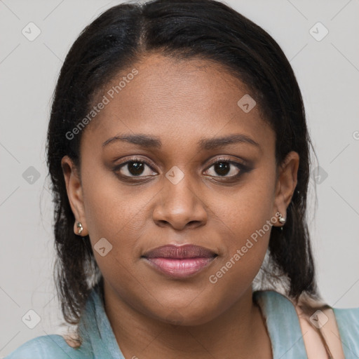 Joyful black young-adult female with medium  brown hair and brown eyes