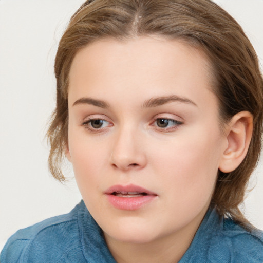 Neutral white child female with long  brown hair and blue eyes