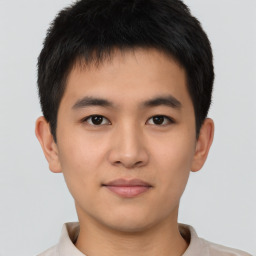 Neutral asian young-adult male with short  brown hair and brown eyes