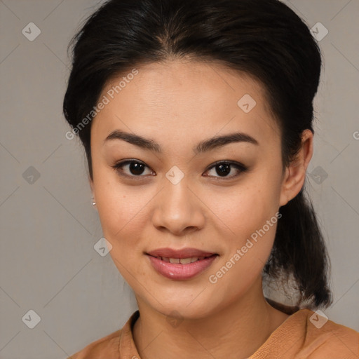 Joyful asian young-adult female with medium  brown hair and brown eyes