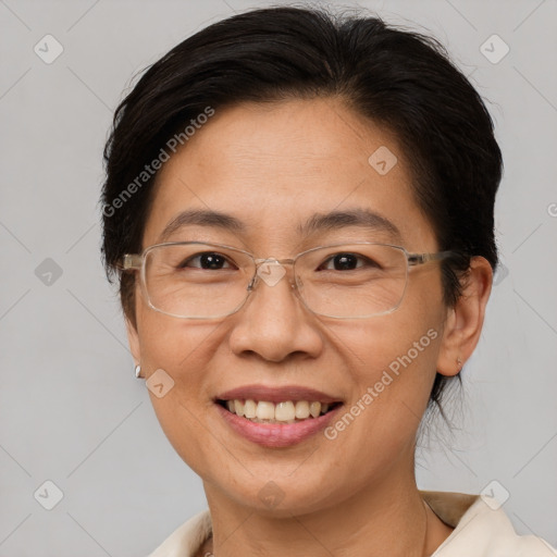 Joyful white adult female with short  brown hair and brown eyes