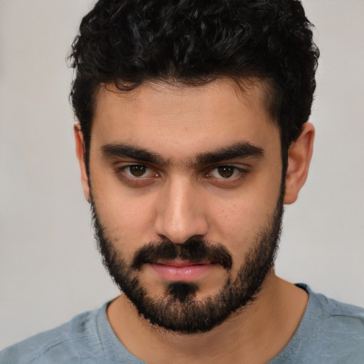 Neutral white young-adult male with short  black hair and brown eyes