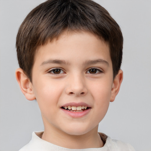 Joyful white child male with short  brown hair and brown eyes