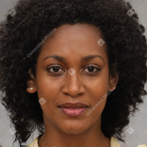 Joyful black young-adult female with long  brown hair and brown eyes