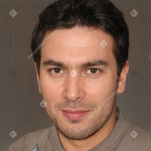 Joyful white adult male with short  brown hair and brown eyes