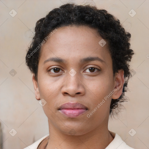 Neutral black young-adult female with short  brown hair and brown eyes