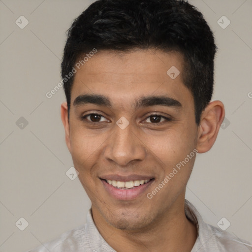 Joyful white young-adult male with short  black hair and brown eyes