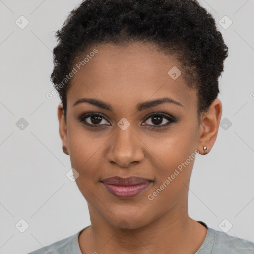 Joyful black young-adult female with short  brown hair and brown eyes