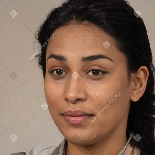 Joyful latino young-adult female with medium  brown hair and brown eyes