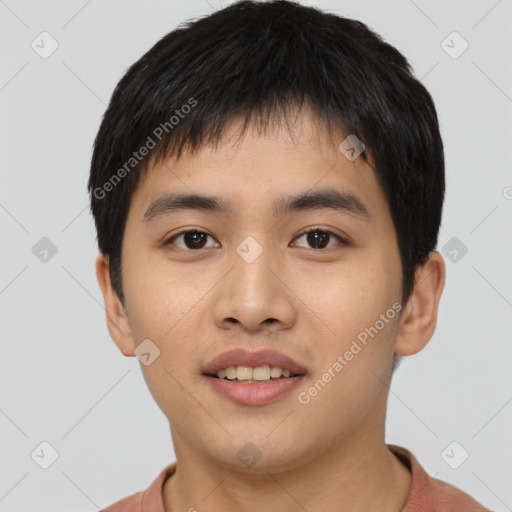 Joyful asian young-adult male with short  black hair and brown eyes