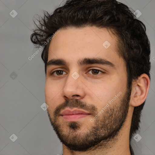 Neutral white young-adult male with short  black hair and brown eyes