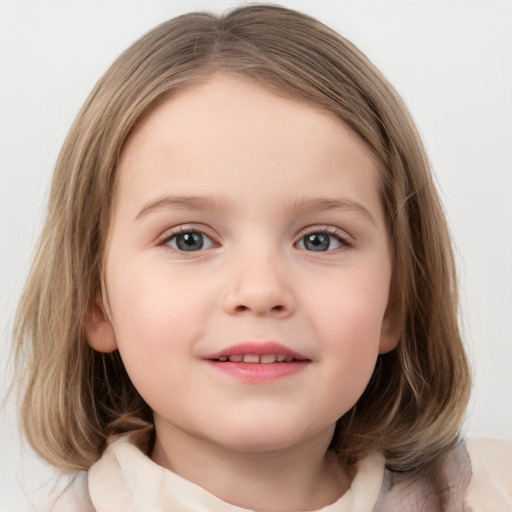 Joyful white child female with medium  brown hair and blue eyes