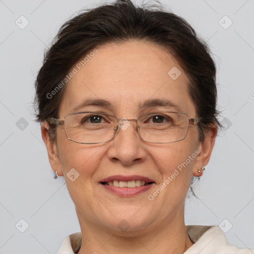 Joyful white adult female with short  brown hair and brown eyes