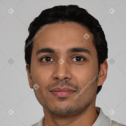 Neutral latino young-adult male with short  black hair and brown eyes