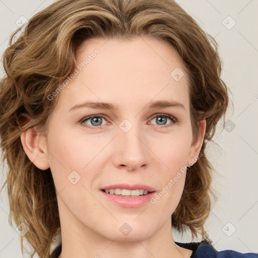 Joyful white young-adult female with medium  brown hair and blue eyes