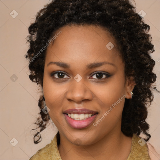 Joyful black young-adult female with medium  brown hair and brown eyes