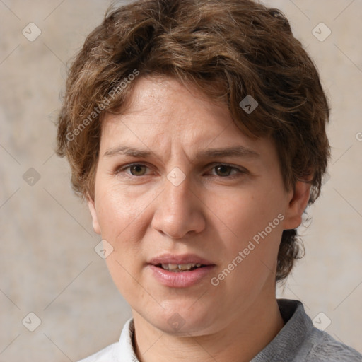 Joyful white adult female with short  brown hair and grey eyes