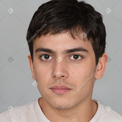 Neutral white young-adult male with short  brown hair and brown eyes