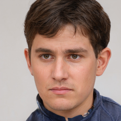Neutral white young-adult male with short  brown hair and grey eyes
