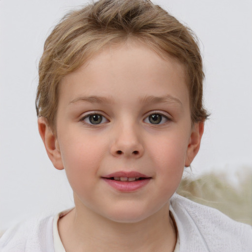 Joyful white child female with short  brown hair and grey eyes