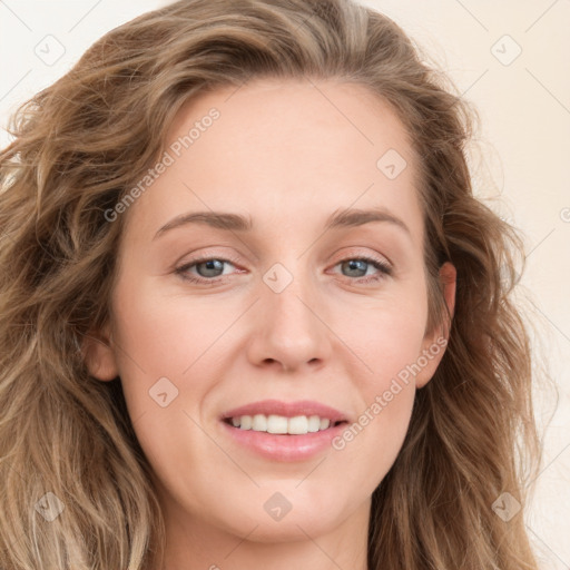 Joyful white young-adult female with long  brown hair and blue eyes