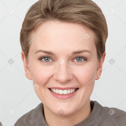 Joyful white young-adult female with short  brown hair and grey eyes