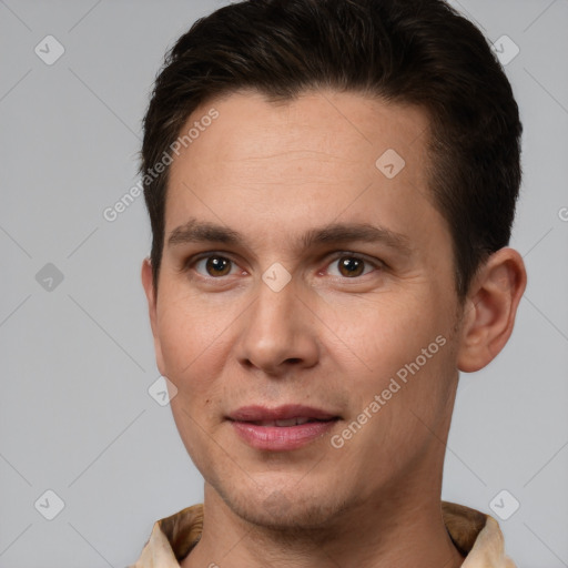 Joyful white young-adult male with short  brown hair and brown eyes