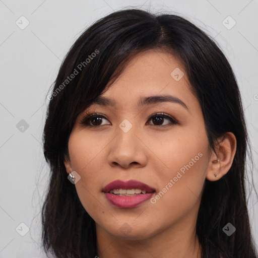 Joyful asian young-adult female with long  brown hair and brown eyes