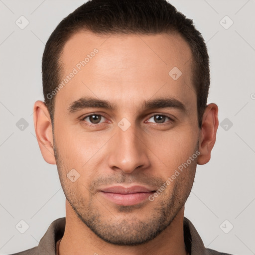 Joyful white young-adult male with short  brown hair and brown eyes