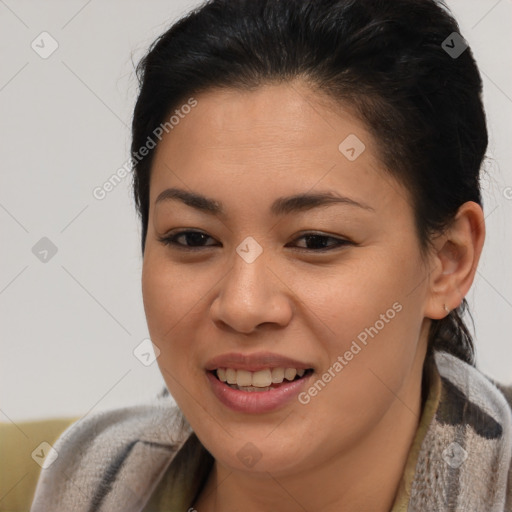 Joyful latino young-adult female with short  brown hair and brown eyes