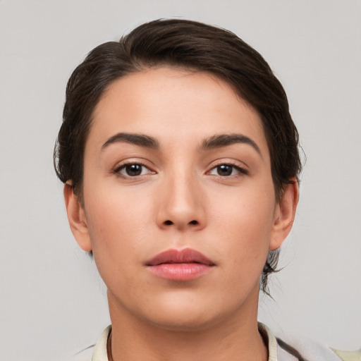 Neutral white young-adult female with short  brown hair and brown eyes