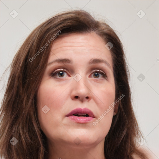 Joyful white young-adult female with long  brown hair and green eyes