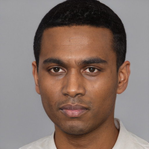 Neutral black young-adult male with short  black hair and brown eyes