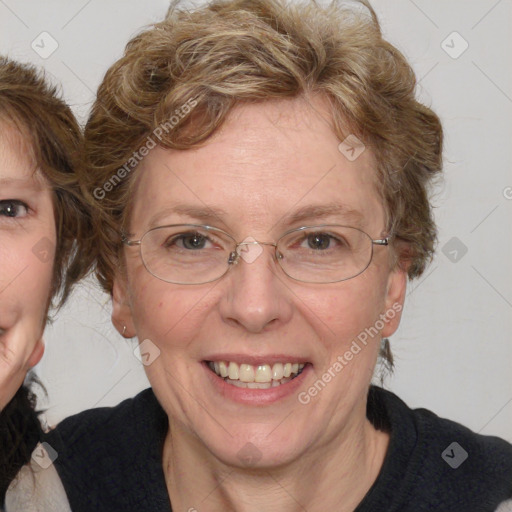 Joyful white adult female with medium  brown hair and blue eyes