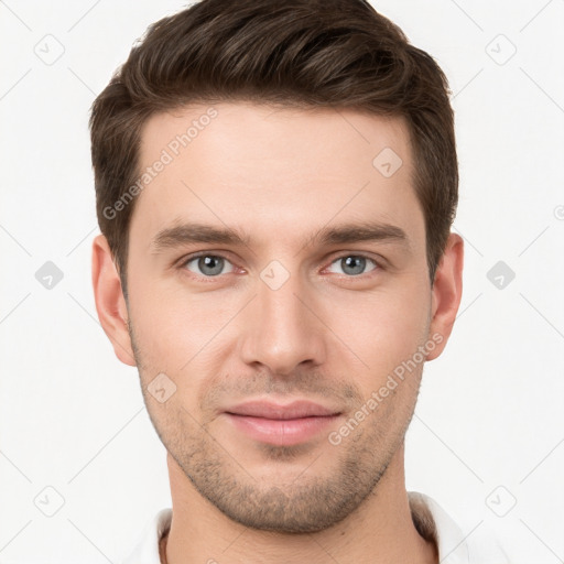 Joyful white young-adult male with short  brown hair and brown eyes