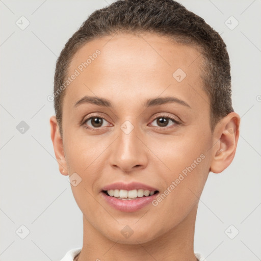 Joyful white young-adult female with short  brown hair and brown eyes