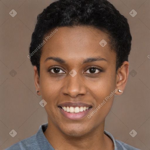 Joyful black young-adult female with short  black hair and brown eyes