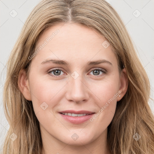 Joyful white young-adult female with long  brown hair and grey eyes