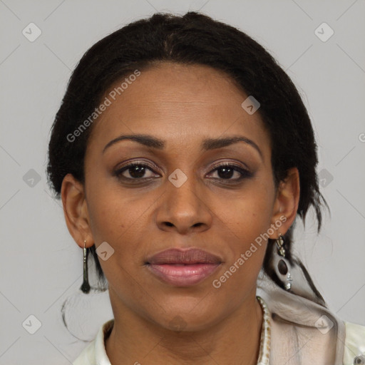 Joyful black adult female with medium  brown hair and brown eyes