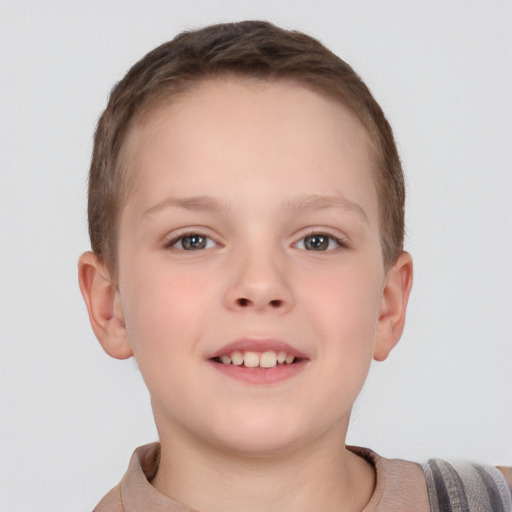 Joyful white child female with short  brown hair and brown eyes