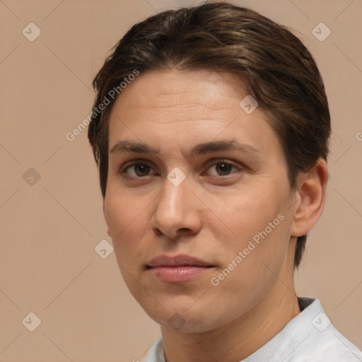 Joyful white adult female with short  brown hair and brown eyes