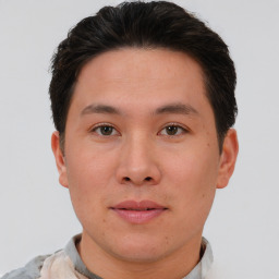 Neutral asian young-adult male with short  brown hair and brown eyes