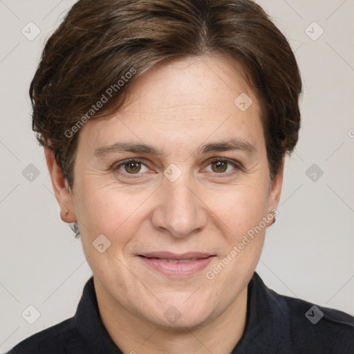 Joyful white adult female with short  brown hair and brown eyes