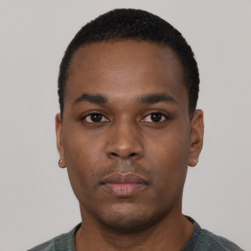 Neutral black young-adult male with short  black hair and brown eyes