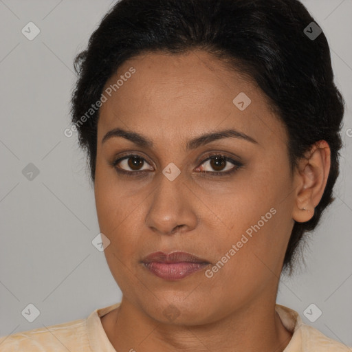Joyful latino young-adult female with short  brown hair and brown eyes
