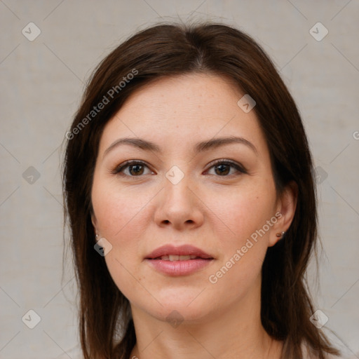 Joyful white young-adult female with medium  brown hair and brown eyes