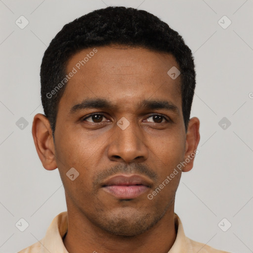 Neutral latino young-adult male with short  black hair and brown eyes